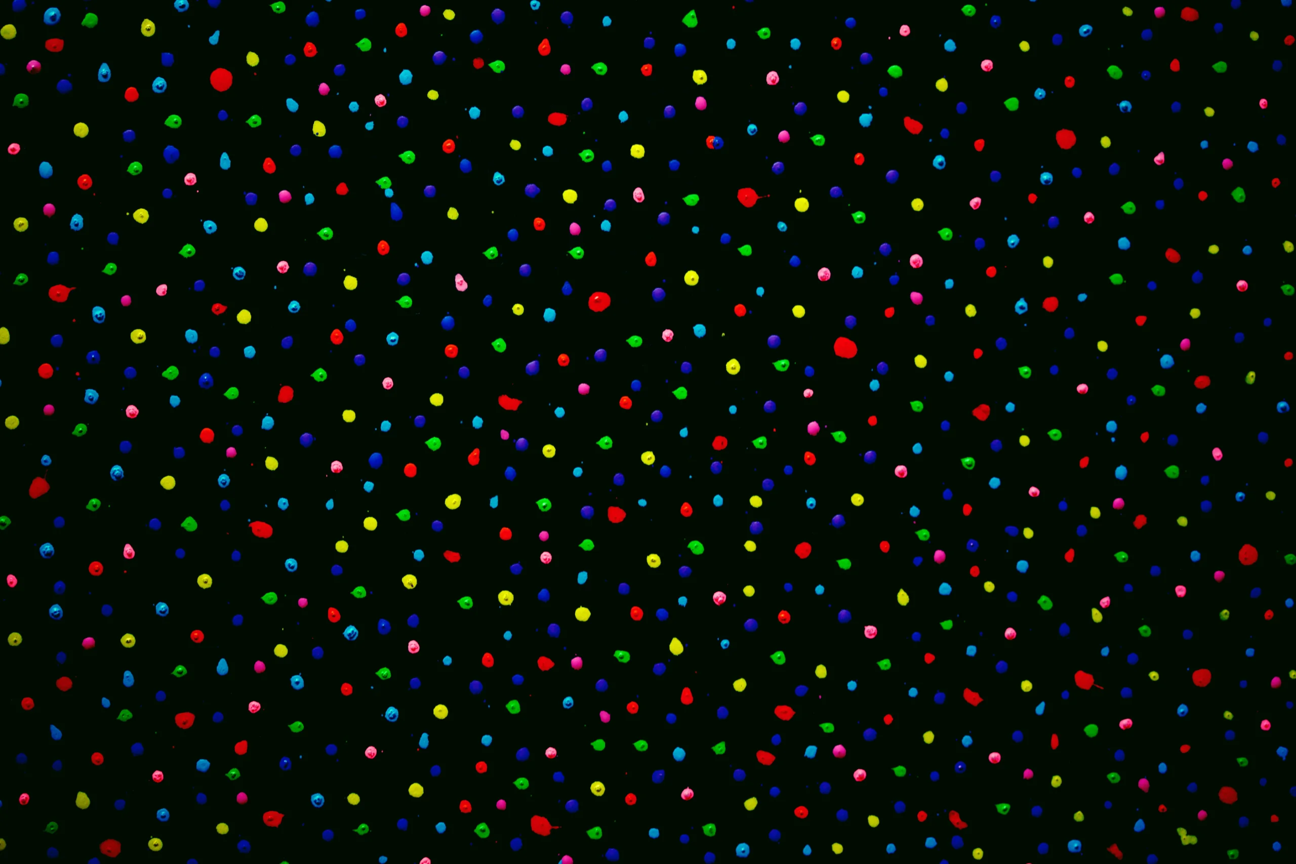 Vibrant abstract art with colorful dots scattered across a black background jigsaw puzzle